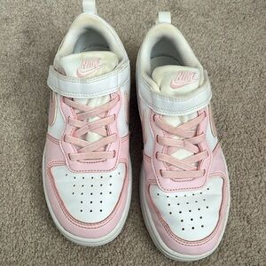 Girls pink and white Nike sneakers size 1. Has some water stains (pictured)